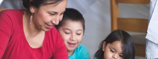 native american mom reads with her kids jpg copy